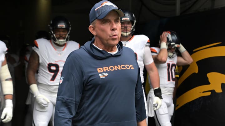 Sep 21, 2025; Inglewood, California, USA;  Denver Broncos head coach Sean Payton leads his film on to the field for the game against the Los Angeles Chargers at SoFi Stadium.