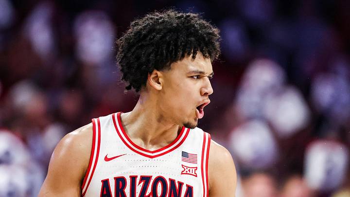 Arizona Wildcats guard Brayden Burries (5) celebrates during the first half of the game against the West Virginia Mountaineers at McKale Memorial Center on January 24, 2026.