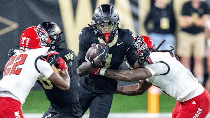 Sep 11, 2025; Winston-Salem, North Carolina, USA;  Wake Forest Demon Deacons wide receiver Sterling Berkhalter (4) catches a pass in the first half against North Carolina State Wolfpack at Allegacy Federal Credit Union Stadium. Mandatory Credit: Luke Jamroz-Imagn Images