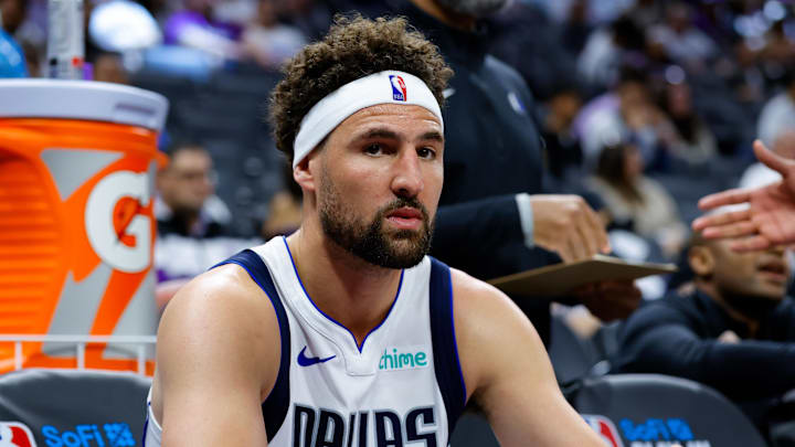 Apr 16, 2025; Sacramento, California, USA; Dallas Mavericks guard Klay Thompson (31) sits on the bench during the fourth quarter against the Sacramento Kings at Golden 1 Center. Mandatory Credit: Sergio Estrada-Imagn Images