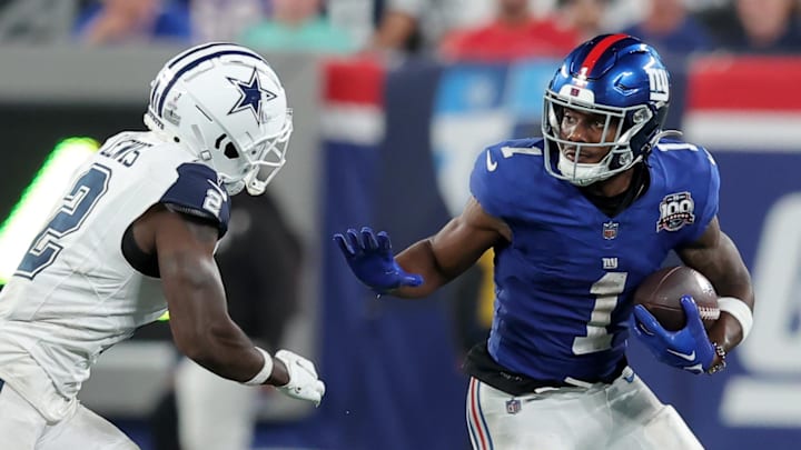 New York Giants wide receiver Malik Nabers runs with the ball against Dallas Cowboys cornerback Jourdan Lewis New York Giants wide receiver Malik Nabers runs with the ball against Dallas Cowboys cornerback Jourdan Lewis