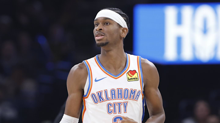 Dec 8, 2023; Oklahoma City, Oklahoma, USA; Oklahoma City Thunder guard Shai Gilgeous-Alexander (2) dribbles the ball down the court against the Golden State Warriors during the second quarter at Paycom Center. Mandatory Credit: Alonzo Adams-Imagn Images