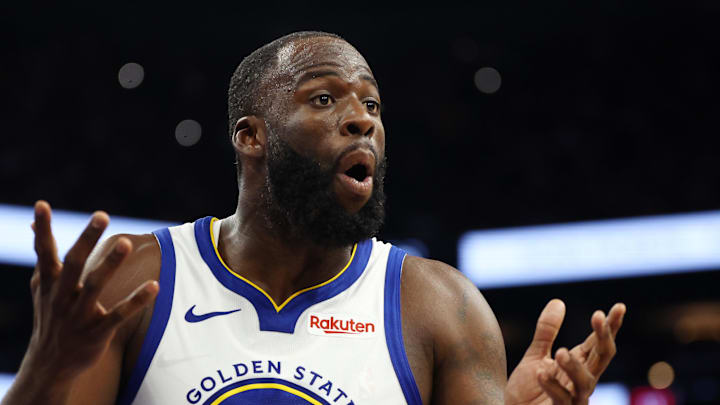 Dec 18, 2025; Phoenix, Arizona, USA; Golden State Warriors forward Draymond Green (23) reacts against the Phoenix Suns in the second half at Mortgage Matchup Center. Mandatory Credit: Mark J. Rebilas-Imagn Images