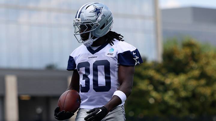 Dallas Cowboys running back Israel Abanikanda goes through a drill during practice at the Ford Center. Dallas Cowboys running back Israel Abanikanda goes through a drill during practice at the Ford Center.