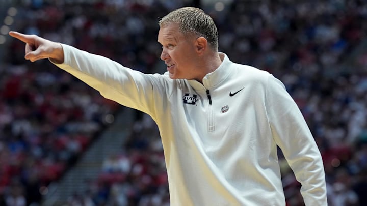 Mar 22, 2026; San Diego, CA, USA; Utah State Aggies head coach Jerrod Calhoun reacts in the first half against the Arizona Wildcats during a second round game of the men's 2026 NCAA Tournament at Viejas Arena. Mandatory Credit: Kirby Lee-Imagn Images