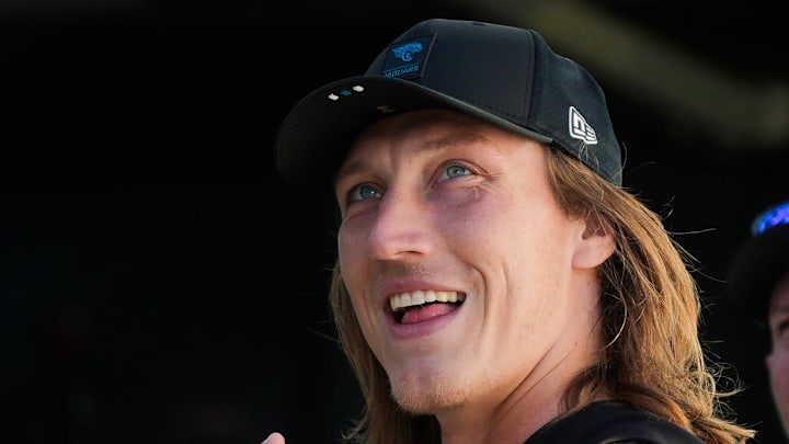 Jacksonville Jaguars quarterback Trevor Lawrence (16) gestures towards a fan while signing autographs before an NFL football game at EverBank Stadium, Sunday, Dec. 14, 2025, in Jacksonville, Fla. [Doug Engle/Florida Times-Union]