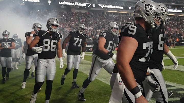 Aug 23, 2024; Paradise, Nevada, USA; Las Vegas Raiders guard Ben Brown (79), guard Jordan Meredith (61) and tight end John Samuel Shenker (86) enter the field before the game against the San Francisco 49ers at Allegiant Stadium. Mandatory Credit: Kirby Lee-Imagn Images Aug 23, 2024; Paradise, Nevada, USA; Las Vegas Raiders guard Ben Brown (79), guard Jordan Meredith (61) and tight end John Samuel Shenker (86) enter the field before the game against the San Francisco 49ers at Allegiant Stadium. Mandatory Credit: Kirby Lee-Imagn Images