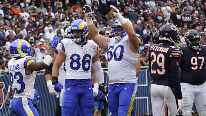 Sep 29, 2024; Chicago, Illinois, USA; Los Angeles Rams running back Kyren Williams (23) celebrates a touchdown against the Chicago Bears during the second half at Soldier Field. Mandatory Credit: David Banks-Imagn Images