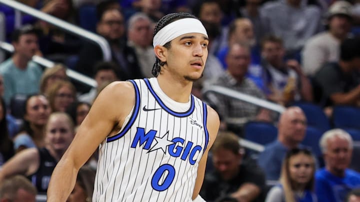Jan 24, 2026; Orlando, Florida, USA; Orlando Magic guard Anthony Black (0) brings the ball up court during the first quarter against the Cleveland Cavaliers at Kia Center. Mandatory Credit: Mike Watters-Imagn Images