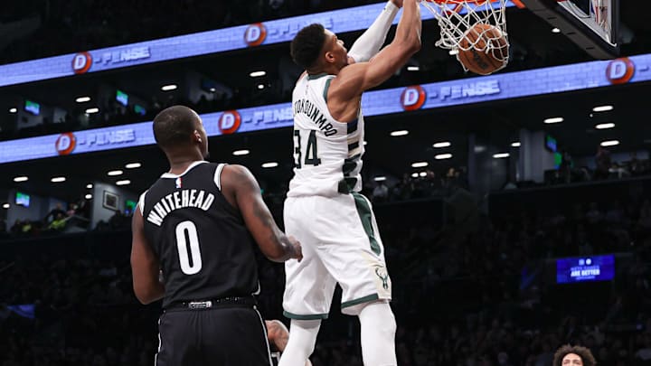 Dec 27, 2023; Brooklyn, New York, USA; Milwaukee Bucks forward Giannis Antetokounmpo (34) dunks the ball in front of Brooklyn Nets forward Dariq Whitehead (0) and forward Jalen Wilson (22) during the second half at Barclays Center. Mandatory Credit: Vincent Carchietta-USA TODAY Sports Dec 27, 2023; Brooklyn, New York, USA; Milwaukee Bucks forward Giannis Antetokounmpo (34) dunks the ball in front of Brooklyn Nets forward Dariq Whitehead (0) and forward Jalen Wilson (22) during the second half at Barclays Center. Mandatory Credit: Vincent Carchietta-USA TODAY Sports