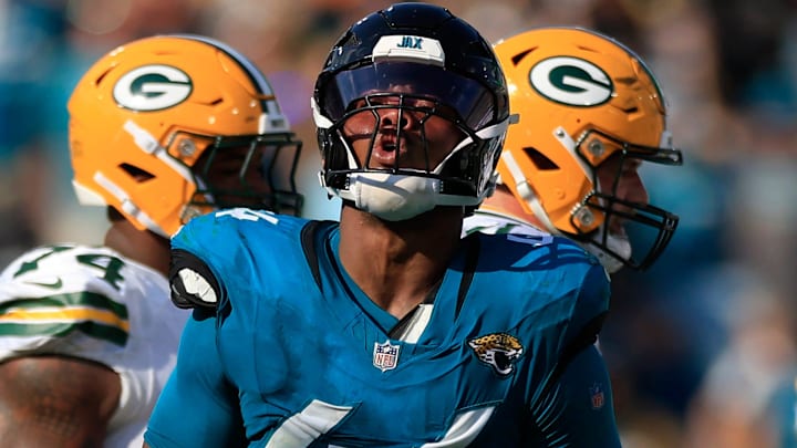 Jacksonville Jaguars defensive end Travon Walker (44) reacts to his sack on Green Bay Packers quarterback Malik Willis (2) during the fourth quarter of an NFL football matchup Sunday, Oct. 27, 2024 at EverBank Stadium in Jacksonville, Fla. The Packers edged the Jaguars 30-27 on a last-second field goal. [Corey Perrine/Florida Times-Union]