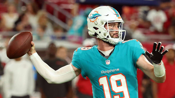 Miami Dolphins quarterback Skylar Thompson looks to throw a pass.