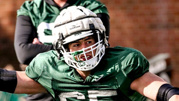 Michigan State offensive lineman Stanton Ramil, right, and Gavin Broscious work out during football practice on Tuesday, April 8, 2025, in East Lansing.