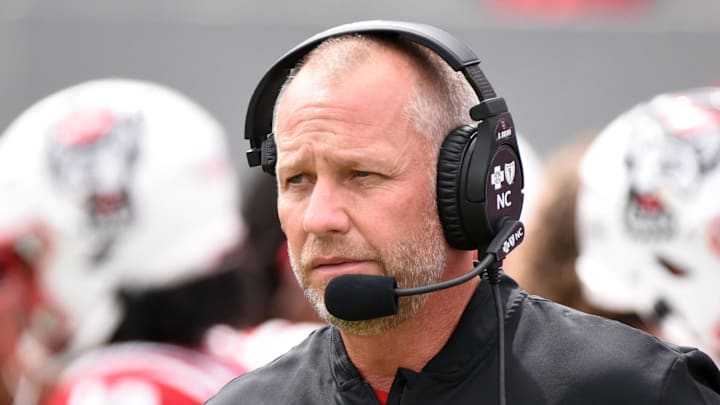 Sep 10, 2022; Raleigh, North Carolina, USA; North Carolina State Wolfpack head coach Dave Doeren prior to a game against the Charleston Southern Buccaneers at Carter-Finley Stadium. Mandatory Credit: Rob Kinnan-Imagn Images Sep 10, 2022; Raleigh, North Carolina, USA; North Carolina State Wolfpack head coach Dave Doeren prior to a game against the Charleston Southern Buccaneers at Carter-Finley Stadium. Mandatory Credit: Rob Kinnan-Imagn Images