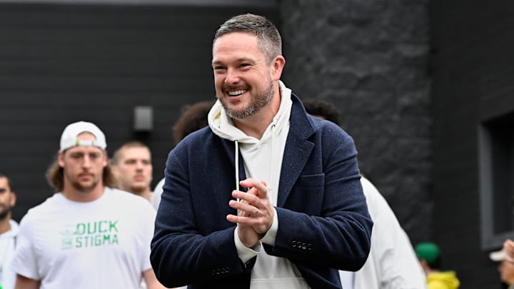 Oct 11, 2025; Eugene, Oregon, USA; Oregon Ducks head coach Dan Lanning arrives with players before the game between the Indiana Hoosiers and the Oregon Ducks at Autzen Stadium. Mandatory Credit: Troy Wayrynen-Imagn Images