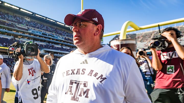 Texas A&M Aggies head coach Mike Elko walks off the field after defeating the Samford Bulldogs 48-0 in a game at Kyle Field. Texas A&M Aggies head coach Mike Elko walks off the field after defeating the Samford Bulldogs 48-0 in a game at Kyle Field.