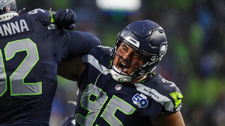 Aug 15, 2025; Seattle, Washington, USA; Seattle Seahawks defensive tackle Brandon Pili (95) celebrates following a safety against the Kansas City Chiefs during the second quarter at Lumen Field.