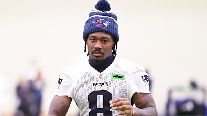 Jun 10, 2025; Foxborough, MA, USA; New England Patriots wide receiver Stefon Diggs (8) walks to the podium to speak to the media after minicamp held in the WIN Field House at Gillette Stadium. Mandatory Credit: Eric Canha-Imagn Images