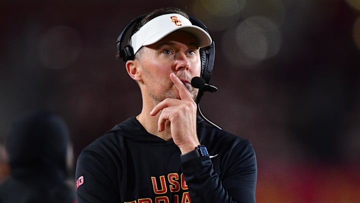 Nov 7, 2025; Los Angeles, California, USA; Southern California Trojans head coach Lincoln Riley watches game action against the Northwestern Wildcats during the second half at the Los Angeles Memorial Coliseum. Mandatory Credit: Gary A. Vasquez-Imagn Images Nov 7, 2025; Los Angeles, California, USA; Southern California Trojans head coach Lincoln Riley watches game action against the Northwestern Wildcats during the second half at the Los Angeles Memorial Coliseum. Mandatory Credit: Gary A. Vasquez-Imagn Images