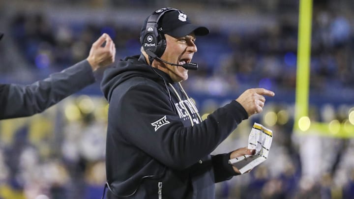 Oct 25, 2025; Morgantown, West Virginia, USA; West Virginia Mountaineers head coach Rich Rodriguez calls out a play during the third quarter against the Texas Christian University Horned Frogs at Milan Puskar Stadium. Mandatory Credit: Ben Queen-Imagn Images Oct 25, 2025; Morgantown, West Virginia, USA; West Virginia Mountaineers head coach Rich Rodriguez calls out a play during the third quarter against the Texas Christian University Horned Frogs at Milan Puskar Stadium. Mandatory Credit: Ben Queen-Imagn Images