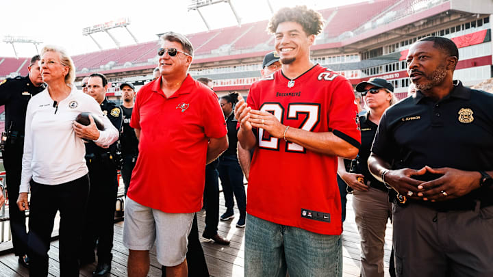 Tampa Mayor Jane Castor, Buccaneers GM Jason Licht, and CB Zyon McCollum present a game ball to the city of Tampa and Florida Law Enforcement for their efforts throughout Hurricane Helene & Milton.