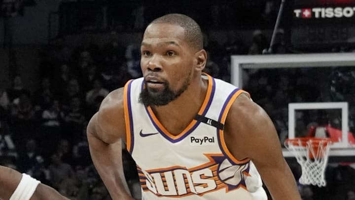 Phoenix Suns forward Kevin Durant dribbles the ball.