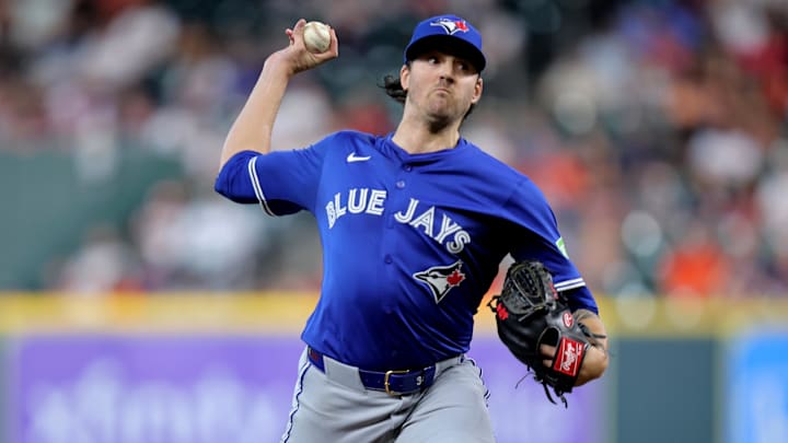 Apr 21, 2025; Houston, Texas, USA; Toronto Blue Jays starting pitcher Kevin Gausman (34) delivers a pitch against the Houston Astros during the first inning at Daikin Park