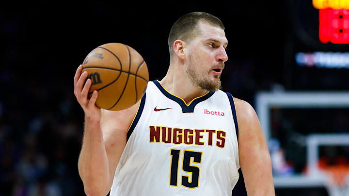 Dec 11, 2025; Sacramento, California, USA; Denver Nuggets center Nikola Jokic (15) controls the ball against the Sacramento Kings during the third quarter at Golden 1 Center. Dec 11, 2025; Sacramento, California, USA; Denver Nuggets center Nikola Jokic (15) controls the ball against the Sacramento Kings during the third quarter at Golden 1 Center.