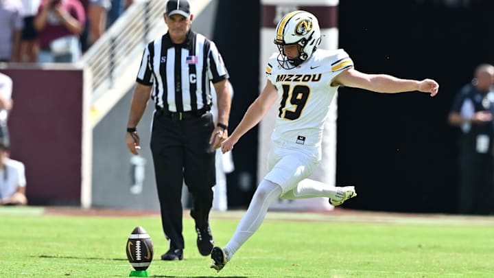 Oct 5, 2024; College Station, Texas, USA; Missouri Tigers place kicker Blake Craig (19) kicks the ball in the third quarter against the Texas A&M Aggies at Kyle Field. Mandatory Credit: Maria Lysaker-Imagn Images. 