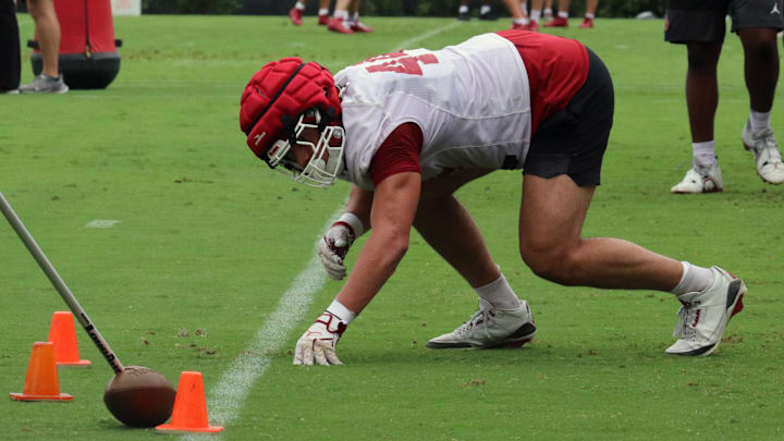 Oklahoma defensive end Taylor Wein working through drills at a fall practice.