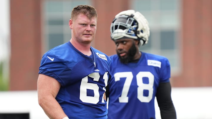 New York Giants center John Michael Schmitz Jr. (61) and offensive tackle Andrew Thomas were among the Giants who suffered injuries i the team's Week 16 loss to the Vikings.