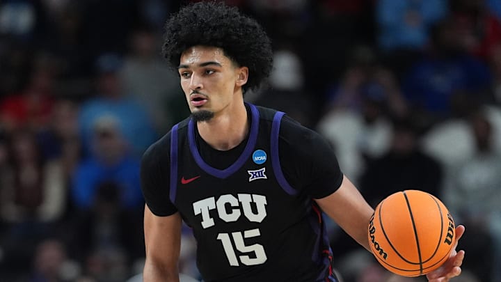 TCU Horned Frogs forward David Punch dribbles the ball against the Ohio State Buckeyes in the second half during a first round game of the men's 2026 NCAA Tournament at Bon Secours Wellness Arena. 