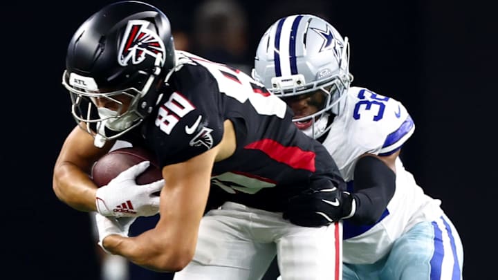 Atlanta Falcons wide receiver Nick Nash (80) runs with the ball as Dallas Cowboys cornerback Troy Pride Jr. (32) defends during the first half at AT&T Stadium.