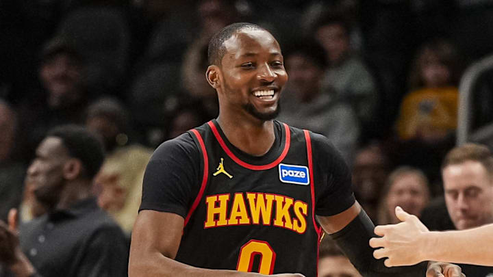 Feb 24, 2026; Atlanta, Georgia, USA; Atlanta Hawks forward Jonathon Kuminga (0) reacts with center Jock Landale (31) after scoring against the Washington Wizards during the first half at State Farm Arena. Mandatory Credit: Dale Zanine-Imagn Images