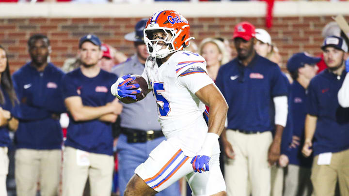 Florida Gators defensive lineman Jayden Woods returns an interception against the Mississippi Rebels during the first quarter at Vaught-Hemingway Stadium. 