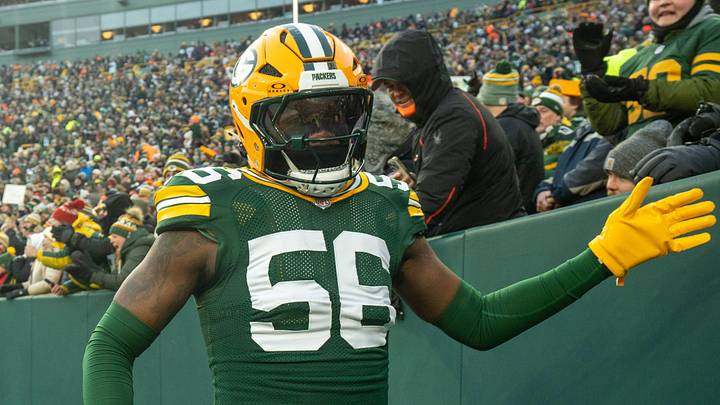 Green Bay Packers linebacker Edgerrin Cooper (56) greets fans before their game Sunday, December 7, 2025 at Lambeau Field in Green Bay, Wisconsin. The Green Bay Packers beat the Chicago Bears 28-21.