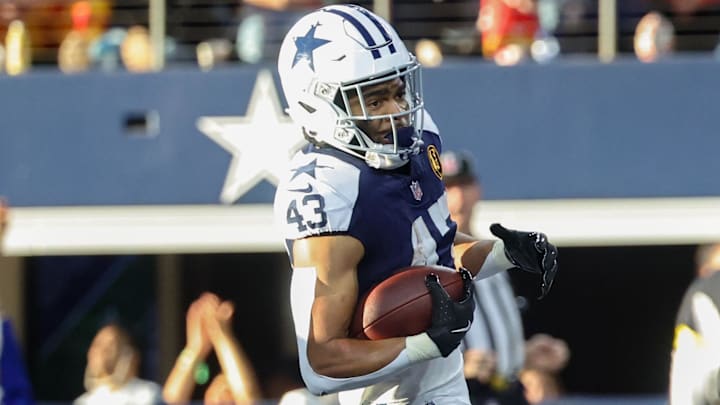 Nov 27, 2025; Arlington, Texas, USA; Dallas Cowboys running back Malik Davis (43) runs for a touchdown against the Kansas City Chiefs during the second quarter at AT&T Stadium. Mandatory Credit: Kevin Jairaj-Imagn Images
