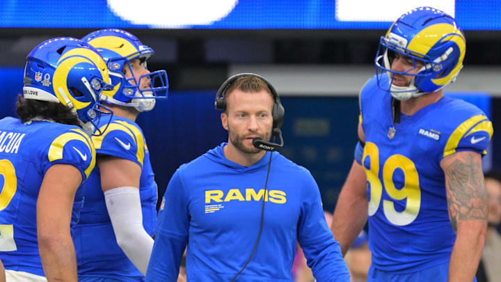 Jan 4, 2026; Inglewood, California, USA;  Los Angeles Rams head coach Sean McVay with wide receiver Puka Nacua (12) after a reception against the Arizona Cardinals during the first half at SoFi Stadium. Mandatory Credit: Jayne Kamin-Oncea-Imagn Images