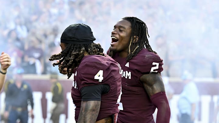Sep 27, 2025; College Station, Texas, USA; Texas A&M Aggies cornerback Will Lee III (4) and cornerback Dezz Ricks (2) react after the game against the Auburn Tigers at Kyle Field. Mandatory Credit: Maria Lysaker-Imagn Images 