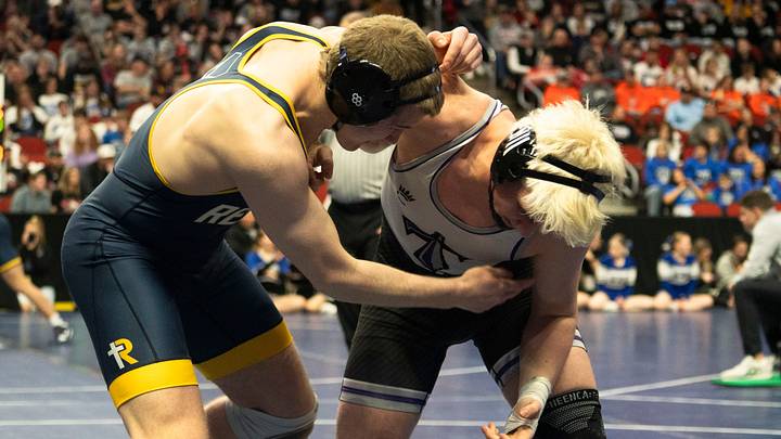 Iowa City Regina's Dawson Boileau wrestles GTRA's Luke Malm at 190 lbs during the Iowa high school boys state wrestling tournament on Thursday, Feb. 19, 2026 in Des Moines.