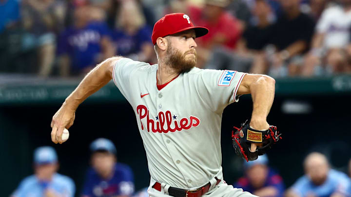 Aug 10, 2025; Arlington, Texas, USA; Philadelphia Phillies starting pitcher Zack Wheeler (45) throws during the first inning against the Texas Rangers at Globe Life Field. Aug 10, 2025; Arlington, Texas, USA; Philadelphia Phillies starting pitcher Zack Wheeler (45) throws during the first inning against the Texas Rangers at Globe Life Field.