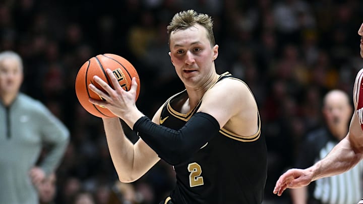 Purdue Boilermakers guard Fletcher Loyer (2) drives against Indiana Hoosiers guard Conor Enright (5). Purdue Boilermakers guard Fletcher Loyer (2) drives against Indiana Hoosiers guard Conor Enright (5).