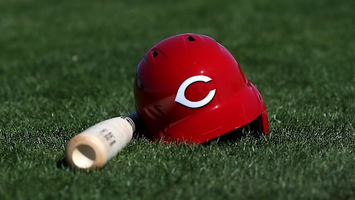 Cincinnati Reds third baseman Eugenio Suarez's (7) bat and helmet