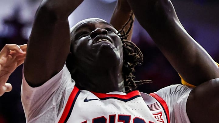 Nov 29, 2025; Tucson, Arizona, USA; Norfolk State Spartans fouls Arizona Wildcats forward Sidi Gueye (15) during the second half at McKale Memorial Center. Mandatory Credit: Aryanna Frank-Imagn Images