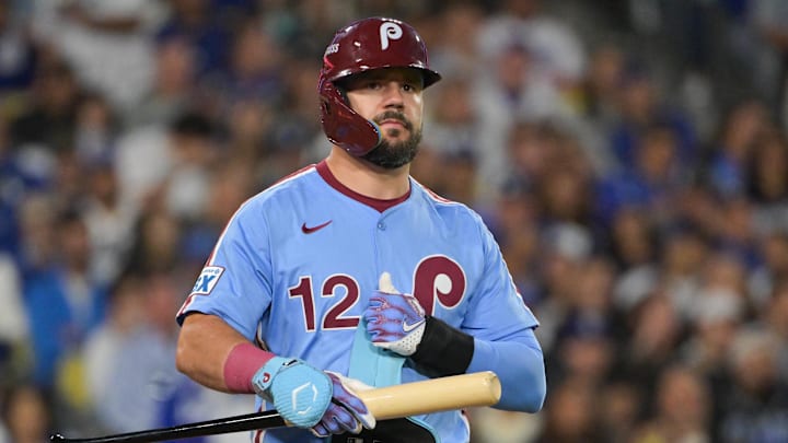 Oct 8, 2025; Los Angeles, California, USA; Philadelphia Phillies designated hitter Kyle Schwarber (12) looks on during the seventh inning against the Los Angeles Dodgers during game three of the NLDS round for the 2025 MLB playoffs at Dodger Stadium. Mandatory Credit: Jayne Kamin-Oncea-Imagn Images