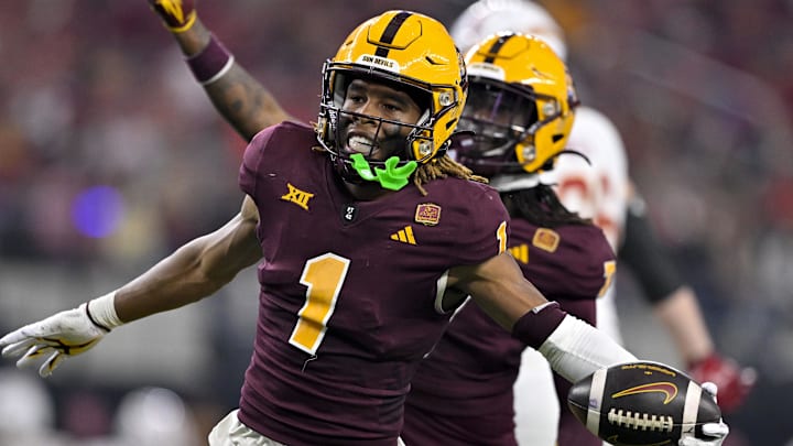 Dec 7, 2024; Arlington, TX, USA; Arizona State Sun Devils defensive back Keith Abney II (1) and defensive back Shamari Simmons (7) celebrate during the game between the Iowa State Cyclones and the Arizona State Sun Devils at AT&T Stadium. Mandatory Credit: Jerome Miron-Imagn Images Dec 7, 2024; Arlington, TX, USA; Arizona State Sun Devils defensive back Keith Abney II (1) and defensive back Shamari Simmons (7) celebrate during the game between the Iowa State Cyclones and the Arizona State Sun Devils at AT&T Stadium. Mandatory Credit: Jerome Miron-Imagn Images