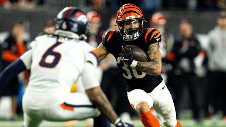 Cincinnati Bengals halfback Chase Brown (30) runs for a first down in the fourth quarter of the NFL game at Paycor Stadium in Cincinnati on Saturday, Dec. 28, 2024.