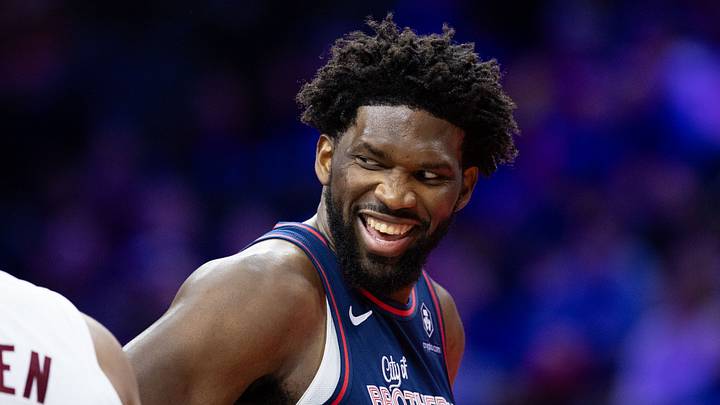 Nov 21, 2023; Philadelphia, Pennsylvania, USA; Philadelphia 76ers center Joel Embiid (21) reacts with Cleveland Cavaliers center Jarrett Allen (31) during the third quarter at Wells Fargo Center.