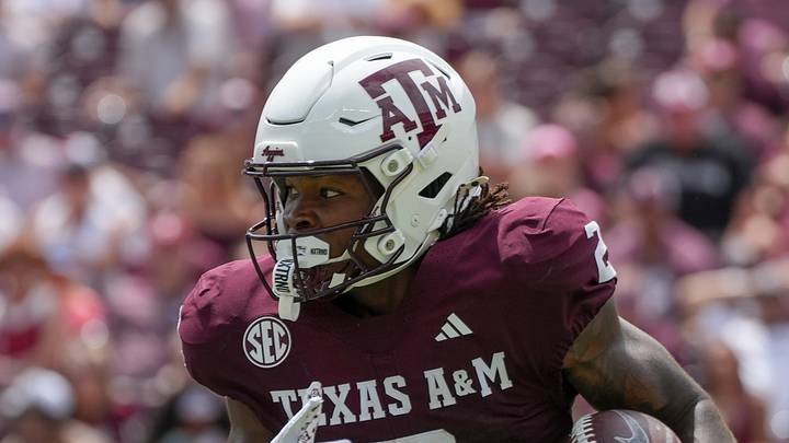 Texas A&M Aggies wide receiver Terry Bussey (2) runs with the football during the second half against the Utah State Aggies at Kyle Field. Texas A&M Aggies wide receiver Terry Bussey (2) runs with the football during the second half against the Utah State Aggies at Kyle Field.