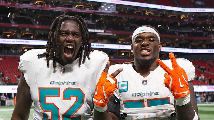 Miami Dolphins offensive tackle Patrick Paul (52) and center Aaron Brewer (55)